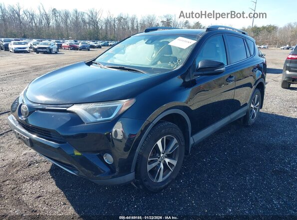 2T3RFREV1HW615288 2017 TOYOTA LE Black Front left