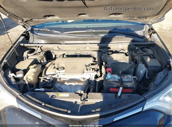 2T3RFREV1HW615288 2017 TOYOTA LE Black Rear view