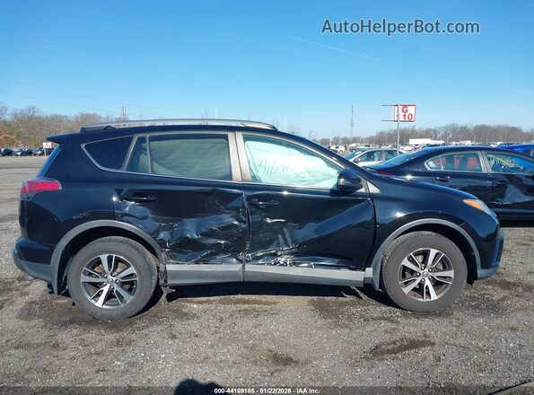 2T3RFREV1HW615288 2017 TOYOTA LE Black Rear interior view
