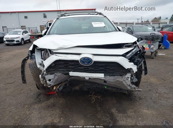 2T3UWRFV1PW163995 2023 TOYOTA RAV4 HYBRID White Vista interior trasera