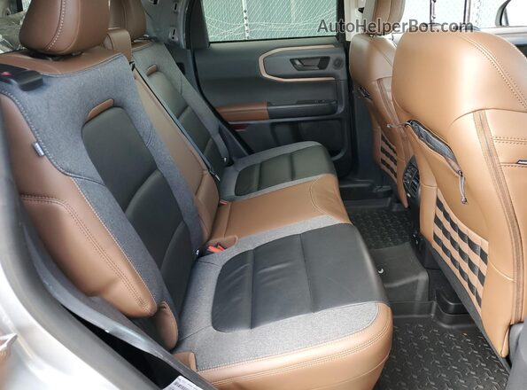 3FMCR9C60PRD17886 2023 FORD BRONCO Серебряный Вид задней части салона