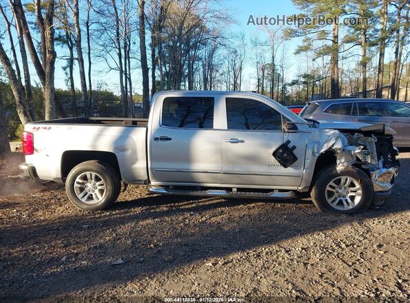 3GCUKSEC2JG394897 2018 CHEVROLET SILVERADO Серебряный Вид задней части салона