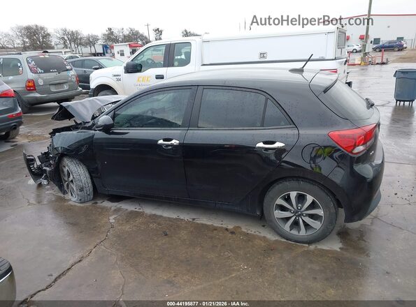 3KPA25AD0ME383948 2021 KIA RIO 5-DOOR Black Вид задньої частини салону