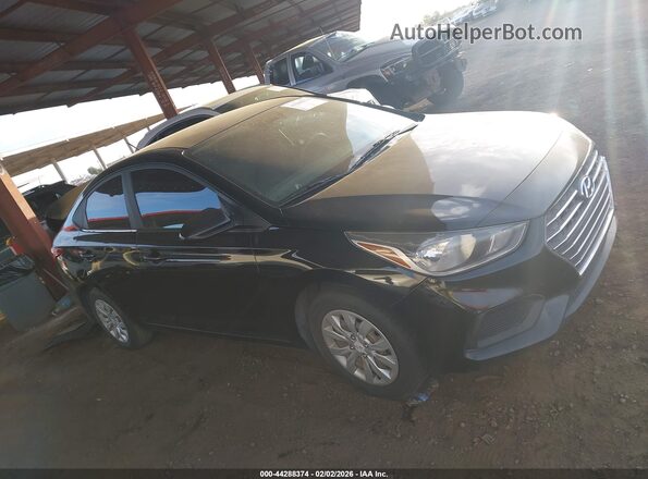 3KPC24A35KE063919 2019 HYUNDAI ACCENT Black Vista interior trasera