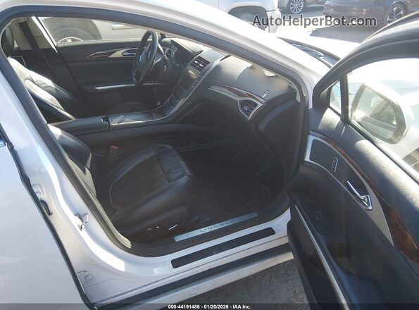 3LN6L2LU9GR603711 2016 LINCOLN MKZ HYBRID White Widok wnętrza z przodu