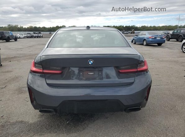 3MW49FF03P8C97201 2023 BMW M3 Gray Հետևի տեսք