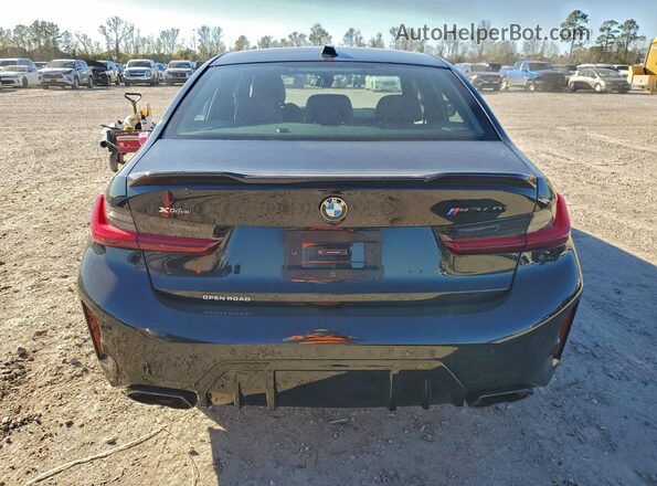 3MW49FF0XR8D98688 2024 BMW M3 Black Widok z tyłu