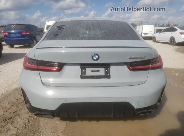 3MW49FS03R8E31486 2024 BMW M3 Gray Vista trasera