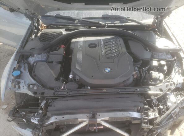 3MW49FS03R8E31486 2024 BMW M3 Gray Vista interior trasera