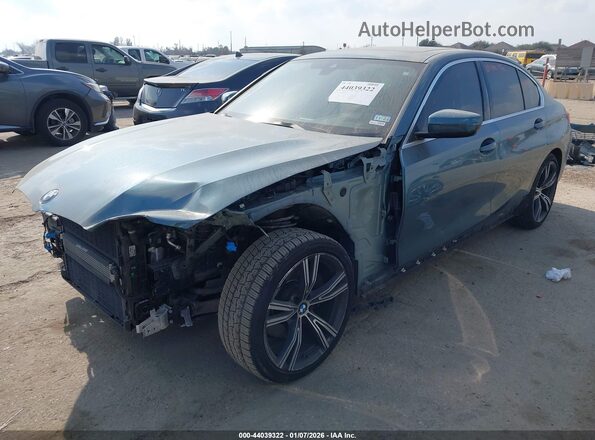 3MW5R1J01M8B62017 2021 BMW 3 SERIES Бирюзовый Передняя левая четверть