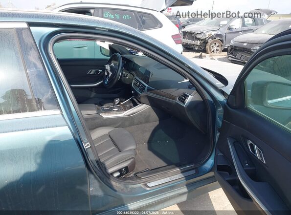 3MW5R1J01M8B62017 2021 BMW 3 SERIES Бирюзовый Вид салона спереди