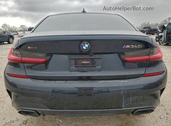 3MW5U9J01M8C17871 2021 BMW M3 Black Widok z tyłu
