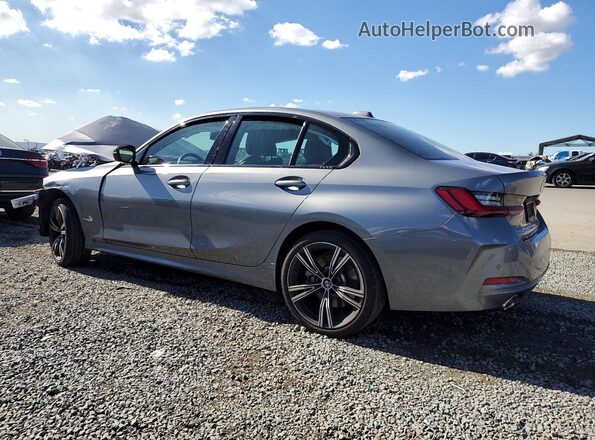 3MW69FF09P8D39623 2023 BMW 3 SERIES Gray Trasero izquierdo