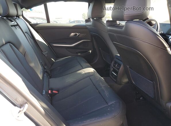 3MW69FF09P8D39623 2023 BMW 3 SERIES Gray Vista de los asientos traseros