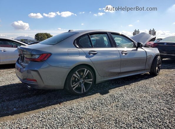 3MW69FF09P8D39623 2023 BMW 3 SERIES Gray Trasero derecho
