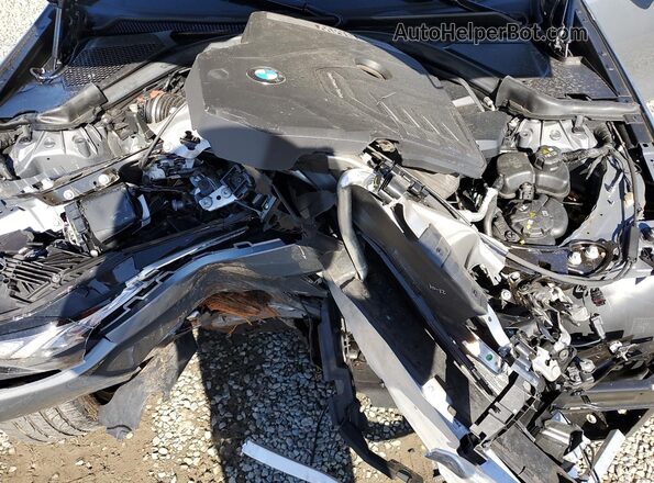 3MW69FF09P8D39623 2023 BMW 3 SERIES Gray Vista interior trasera