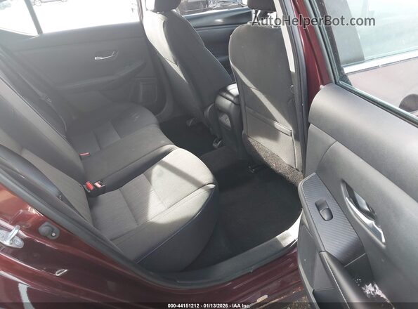 3N1AB8CV9PY307772 2023 NISSAN SENTRA Maroon VIN կոդի պիտակի տեսք