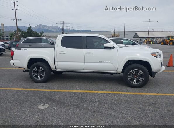 3TMAZ5CN0JM055741 2018 TOYOTA TACOMA White Rear interior view