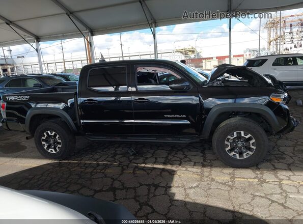 3TMCZ5AN1PM586029 2023 TOYOTA TACOMA Black Rear interior view