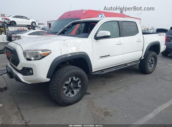 3TMCZ5AN9KM224913 2019 TOYOTA TACOMA White Vista tres cuartos delantera izquierda