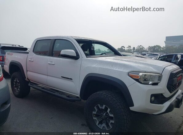 3TMCZ5AN9KM224913 2019 TOYOTA TACOMA White Vista interior trasera