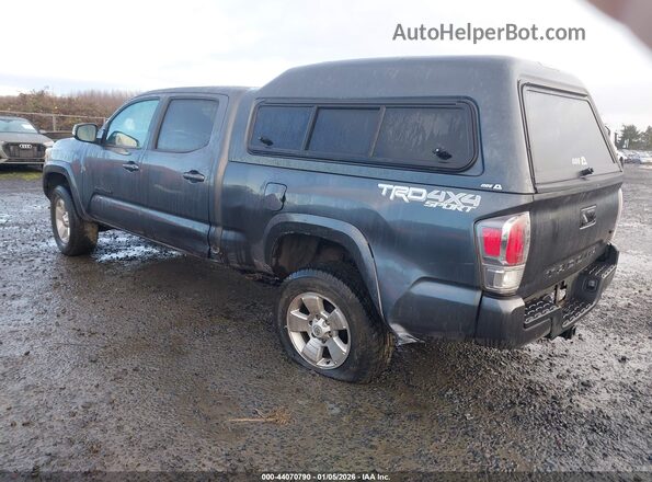 3TMDZ5BN0PM141297 2023 TOYOTA TACOMA Gray Trasero izquierdo