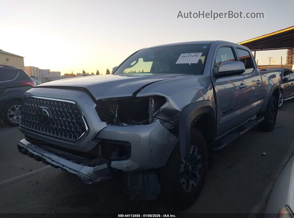 3TMDZ5BN6KM064038 2019 TOYOTA TACOMA Silver წინა მარცხენა ხედი სამი მეოთხედიდან