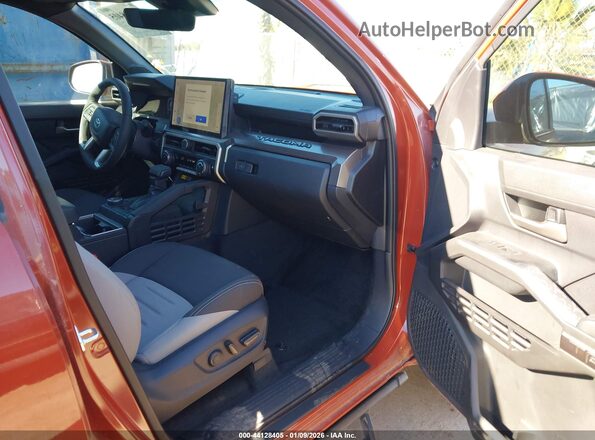 3TMKB5FN9SM035400 2025 TOYOTA TACOMA Orange Вид салону спереду