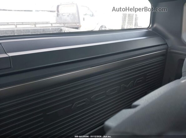 3TYJDAHN7ST026758 2025 TOYOTA TACOMA White Vista de la etiqueta del VIN