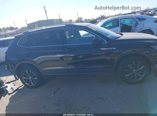 3VV3B7AX0NM062631 2022 VOLKSWAGEN TIGUAN Blue Widok wnętrza z tyłu