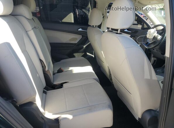 3VV3B7AX1KM108012 2019 VOLKSWAGEN TIGUAN Green Rear seats view