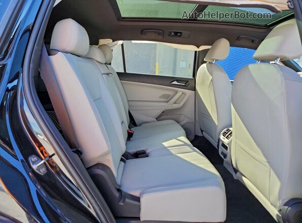 3VVCB7AX0PM034332 2023 VOLKSWAGEN TIGUAN Charcoal Rear interior view