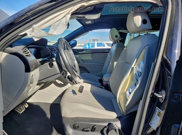 3VVCB7AX0PM034332 2023 VOLKSWAGEN TIGUAN Charcoal Front interior view