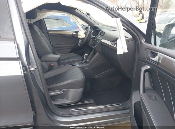 3VVCB7AX5PM065429 2023 VOLKSWAGEN TIGUAN Blue Widok wnętrza z przodu