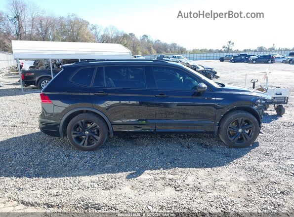 3VVCB7AX8RM231459 2024 VOLKSWAGEN TIGUAN Black Vista interior trasera