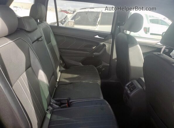 3VVCB7AX9NM059968 2022 VOLKSWAGEN TIGUAN Silver Vista interior trasera