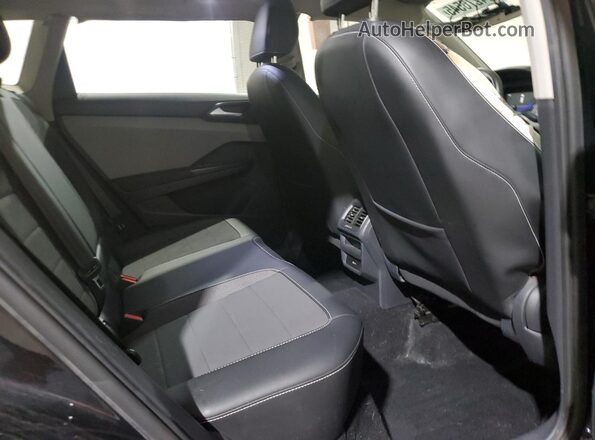 3VVLX7B20NM018312 2022 VOLKSWAGEN TAOS Black Vista interior trasera