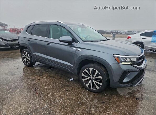 3VVRX7B2XNM034592 2022 VOLKSWAGEN TAOS Серый Передняя правая четверть