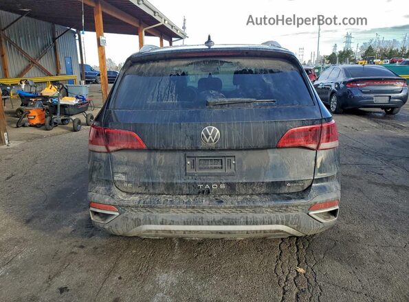 3VVUX7B24RM078085 2024 VOLKSWAGEN TAOS Black Rear view