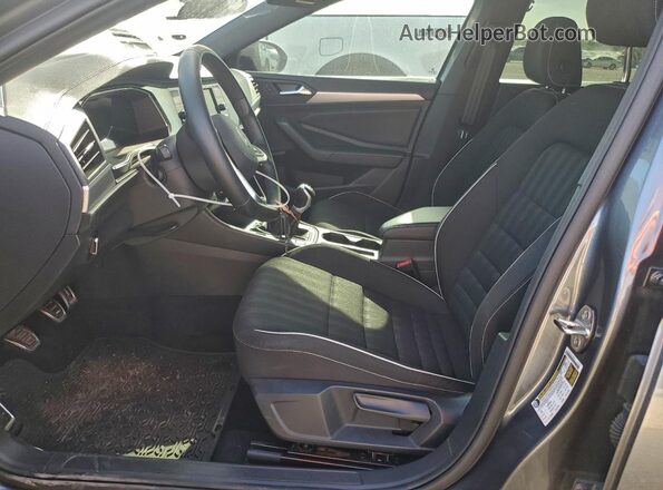 3VWAM7BU3PM035928 2023 VOLKSWAGEN JETTA Gray Vista interior delantera