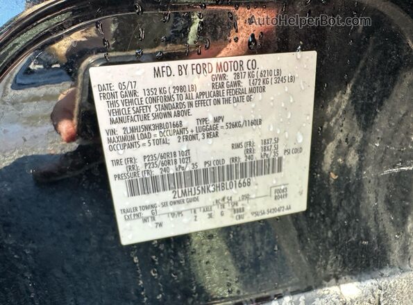 2LMHJ5NK3HBL01668 2017 LINCOLN MKT Black Widok wnętrza z tyłu