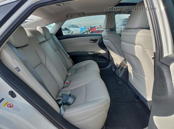 4T1BD1EB9JU061351 2018 TOYOTA AVALON White Rear seats view