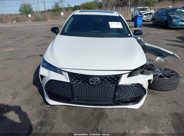 4T1BZ1FB1KU006099 2019 TOYOTA AVALON Белый Вид задней части салона