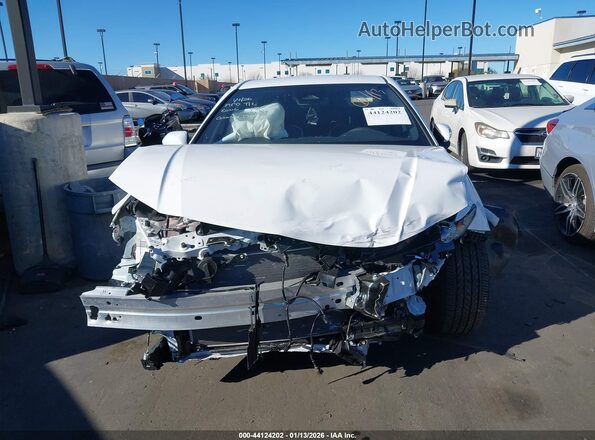 4T1DAACK9SU631256 2025 TOYOTA CAMRY White Вид задньої частини салону