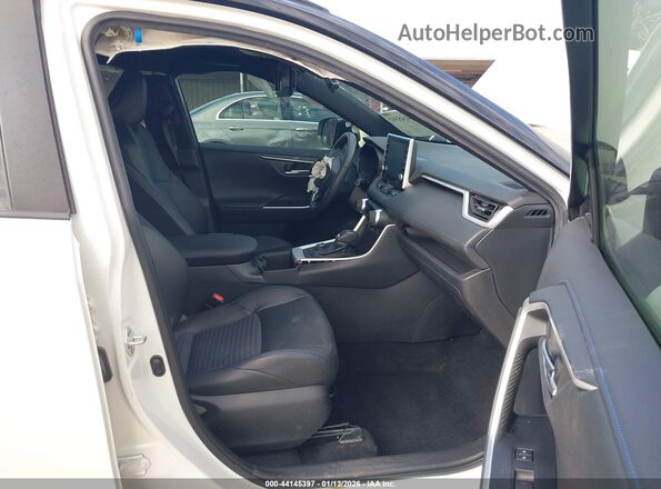 4T3E6RFV0NU103255 2022 TOYOTA RAV4 HYBRID White წინა სალონის ხედი