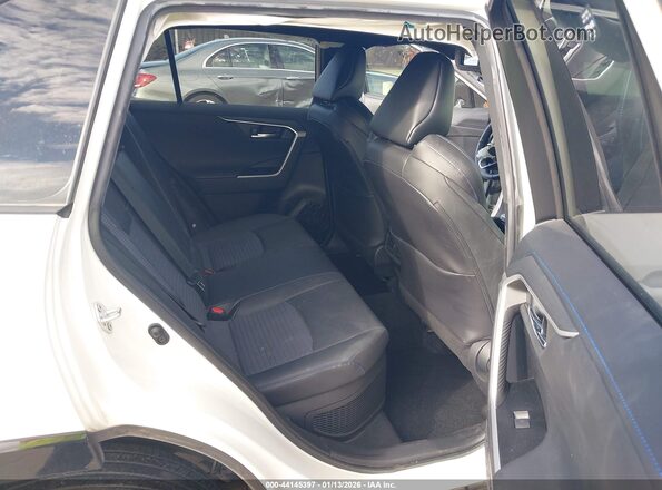 4T3E6RFV0NU103255 2022 TOYOTA RAV4 HYBRID White VIN კოდის სტიკერის ხედი