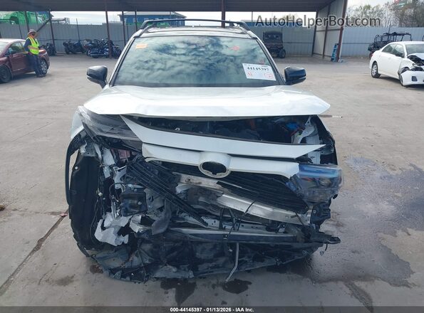 4T3E6RFV0NU103255 2022 TOYOTA RAV4 HYBRID White ხელსაწყოთა პანელის ხედი