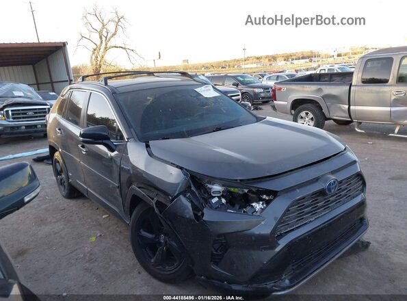 4T3E6RFVXMU010659 2021 TOYOTA RAV4 HYBRID Gray Rear interior view