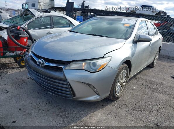 4T4BF1FK2GR567160 2016 TOYOTA LE Серебряный Передняя левая четверть