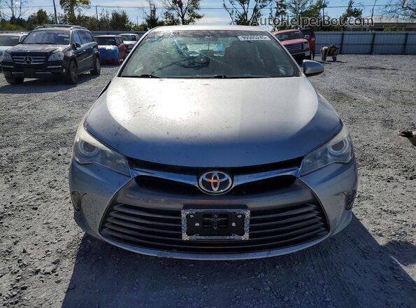 4T4BF1FK9GR582397 2016 TOYOTA LE Серебряный Вид спереди